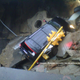 Illustration for article titled Milwaukee Sinkhole Swallows Cadillac Escalade, Traffic Light